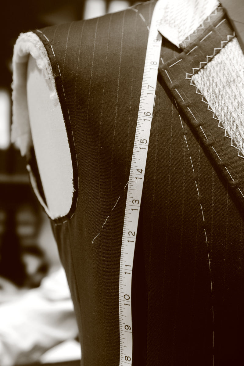 Experience luxury bespoke custom tailored suiting with artisanal precision, full canvas, handstitched, and milanese buttonholes. 